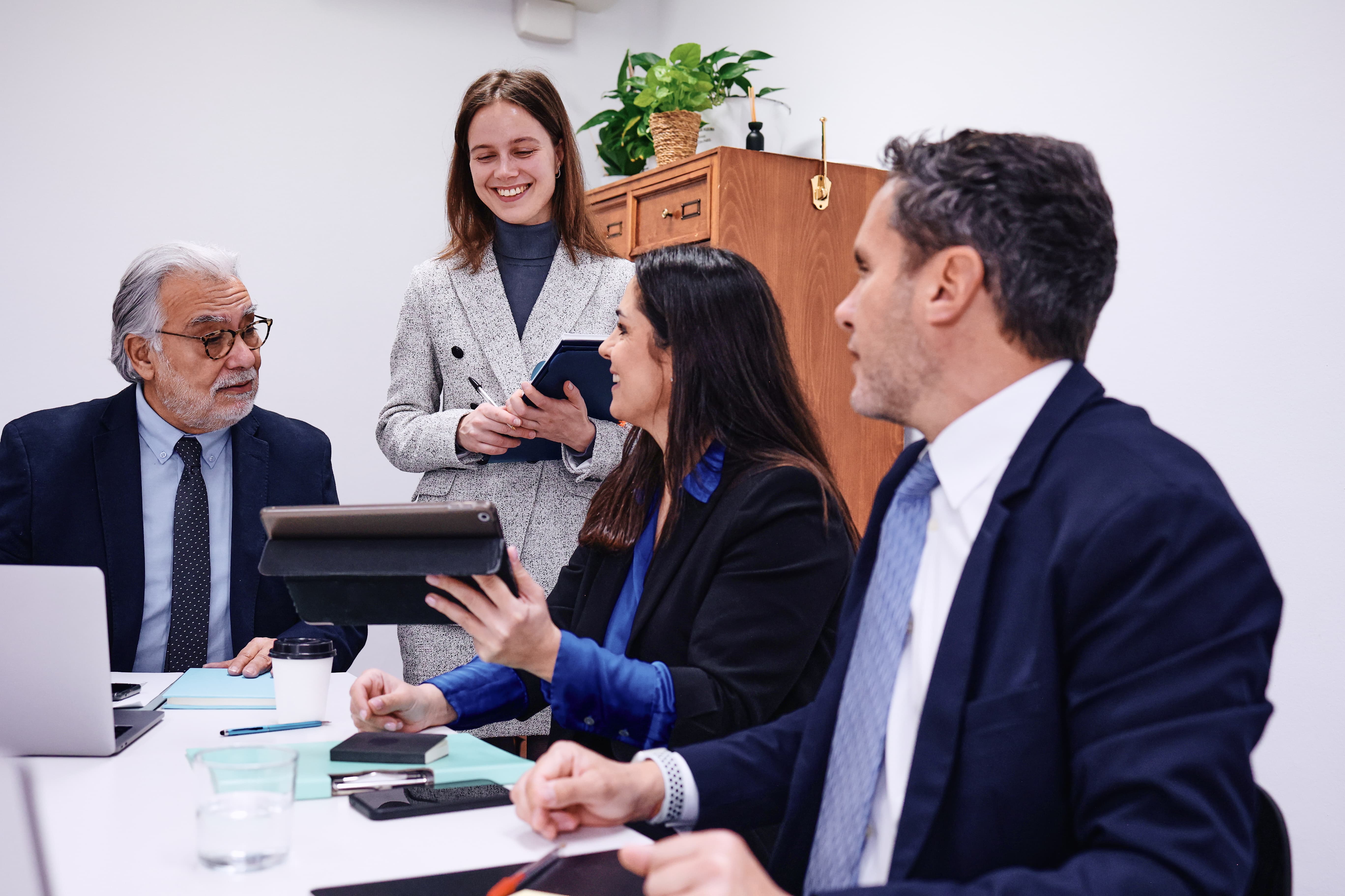 Four coworkers working together